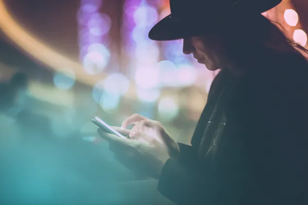 1777DET Login — Instantly access your secure account A confident dealer surrounded by casino chips inviting players to access their 1777DET account, reflecting quick and easy login options.